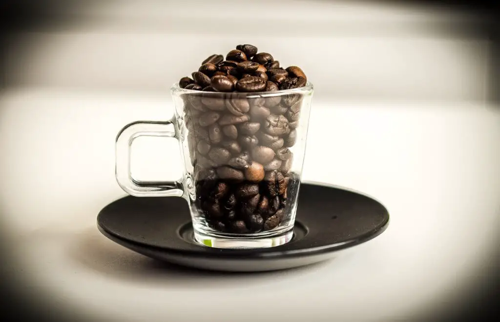A mug with coffee beans 